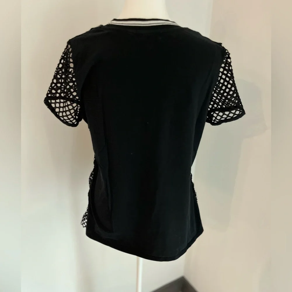 Verve ami middle size  crochet front black top. Knit 92% cotton 8% Spandex